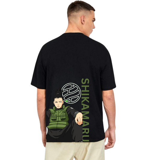 Man wearing black Shikamaru t-shirt with anime character and green text on back