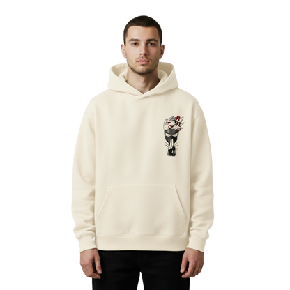 Man wearing a cream hoodie with a graphic design of kakashi on a white background