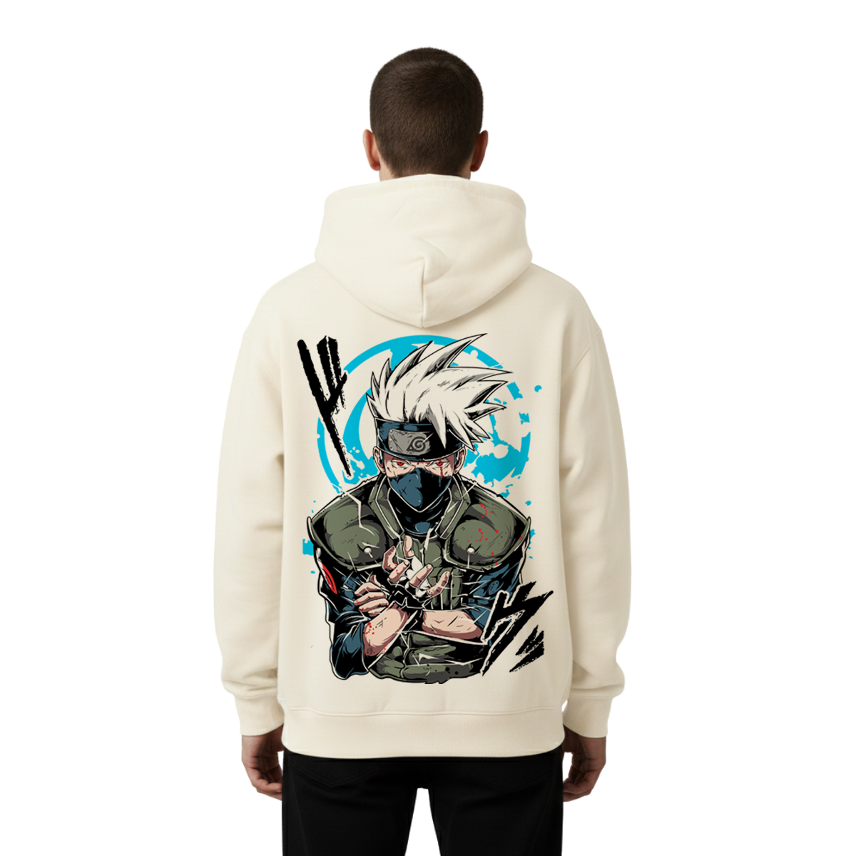 Person wearing a cream Kakashi hoodie with a graphic design on the back against a white background