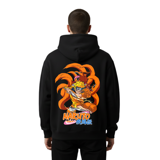 Black hoodie with Naruto graphic on the back, worn by a person