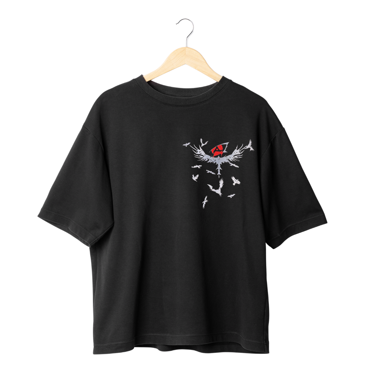 Itachi Uchicha  Black t-shirt with a white graphic design on a hanger against a white background
