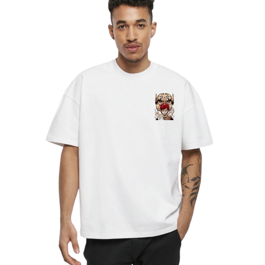Man wearing a Gaara t-shirt with a colorful graphic design on a white 
