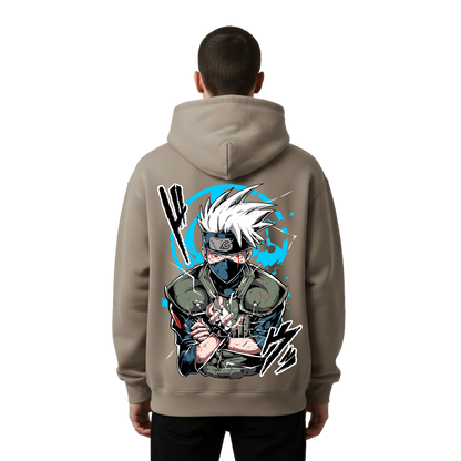 Person wearing a hoodie with a graphic design of kakashi on the back against a white background